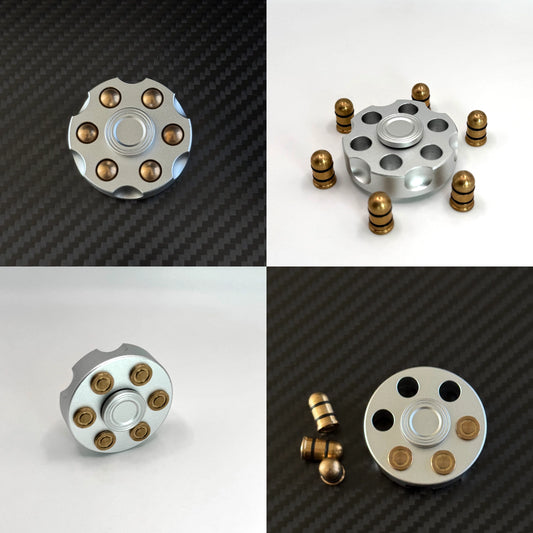 Multiple angles showing the spinner with various bullet positions and extraction stages.