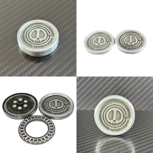 Four separate angle shots capturing the structural profile and detail of the Skull Coin in both closed and open formats.
