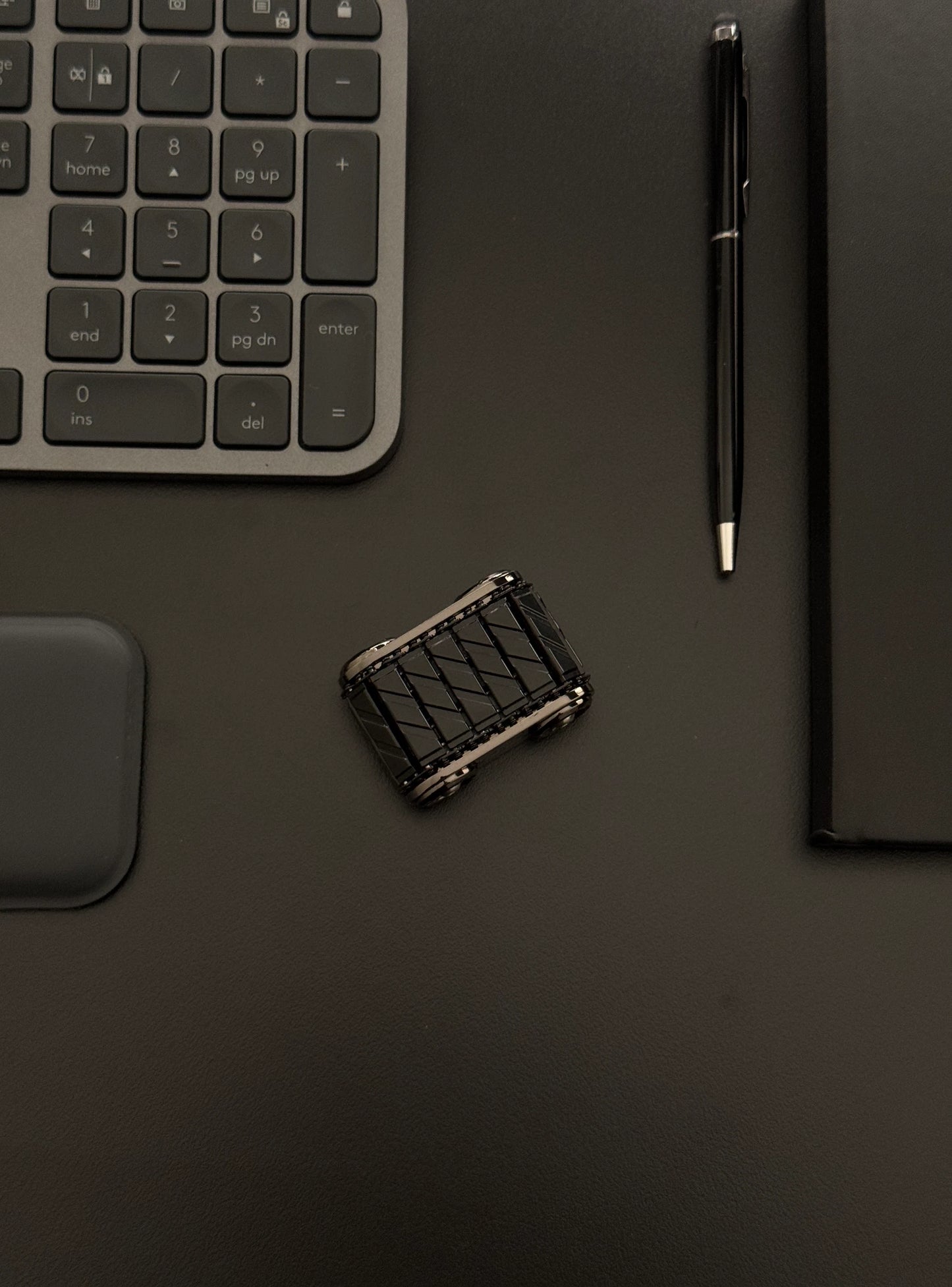 Tank Roller on a desk setup, emphasizing its sleek and professional appearance.