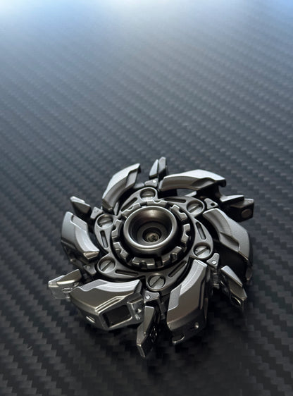 Compact spinner shown near a pocket or bag, demonstrating its portability for on-the-go stress relief
