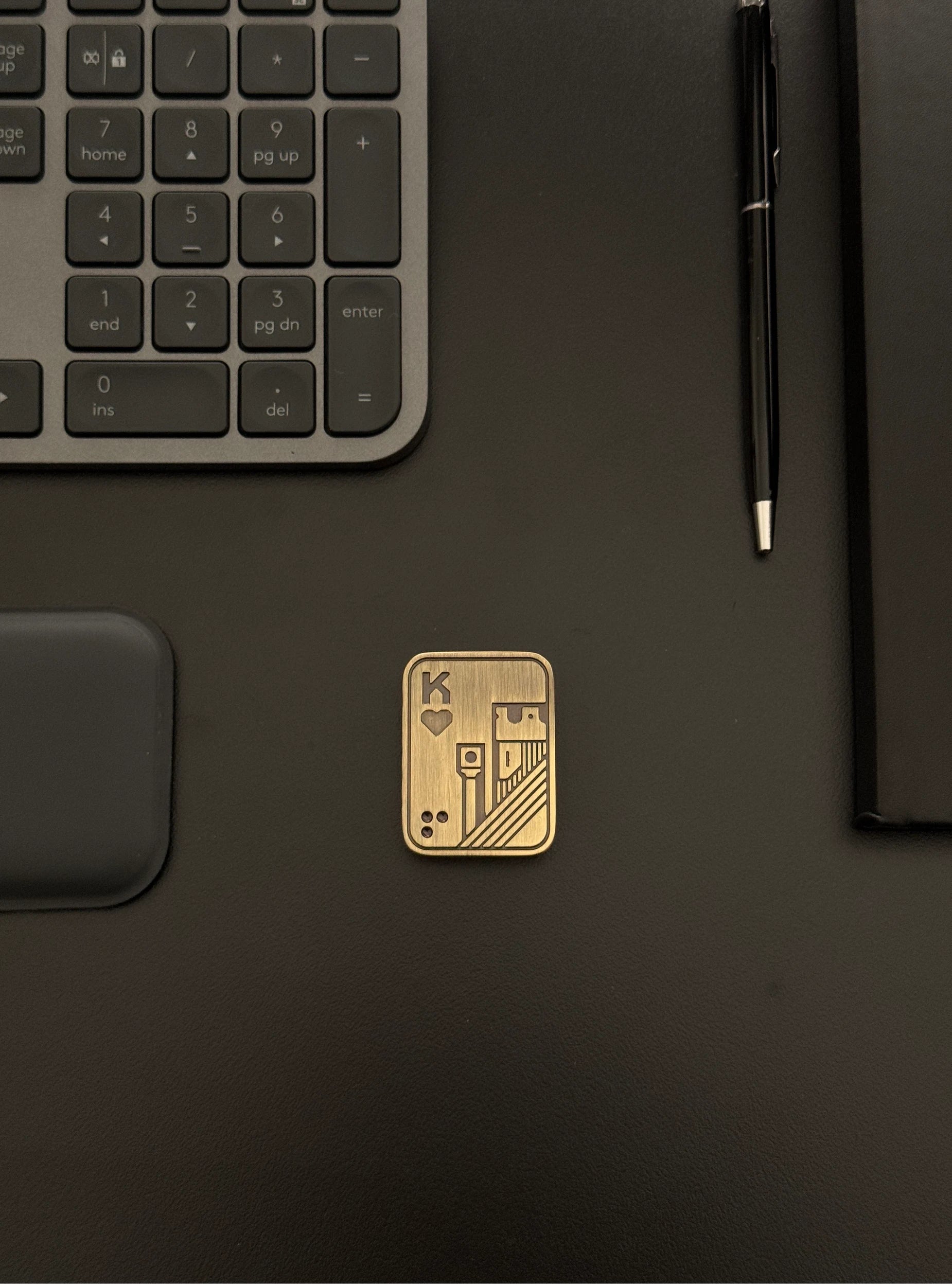Alternate angle showcasing the Metal Poker Card Fidget Toy's magnetic locking system and smooth finish.​
